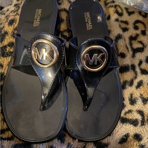 Michael Kors Glossy Black Slides with Gold Emblem